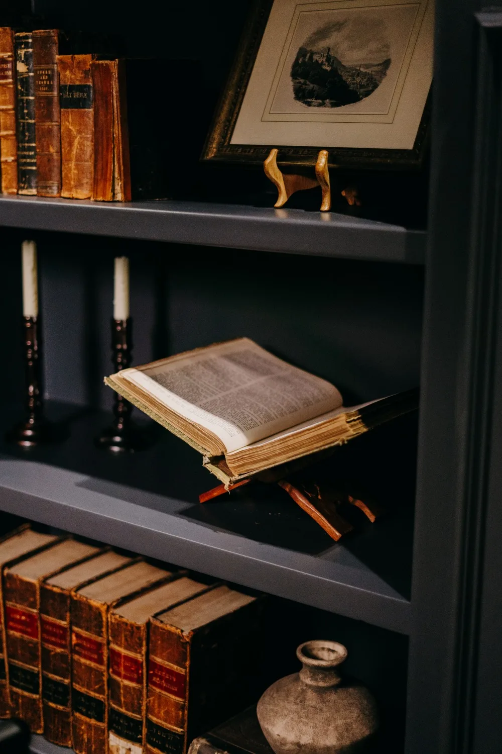 An open Bible on a wooden stand in the studio